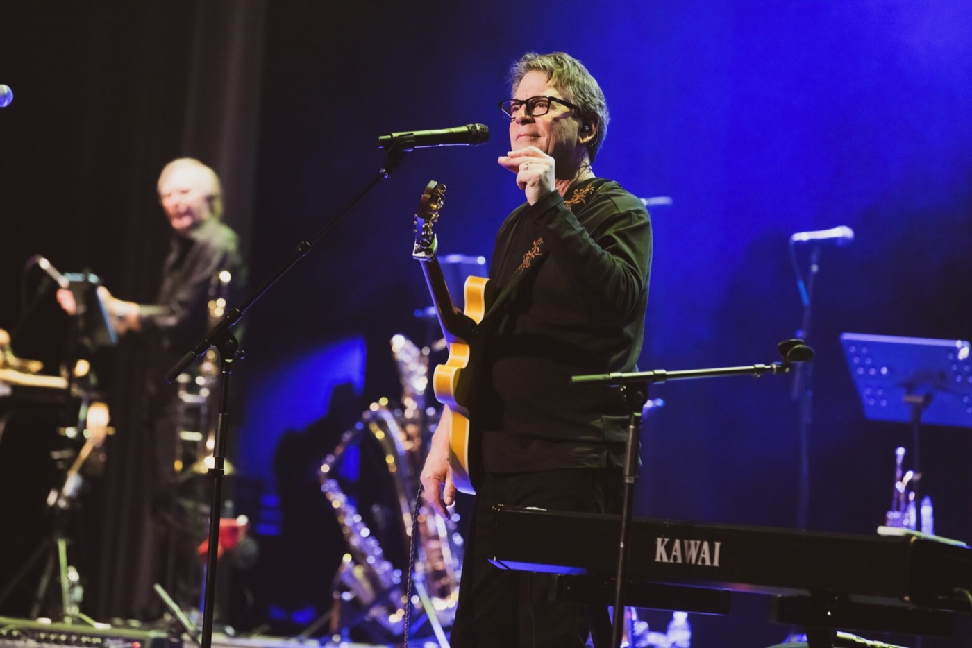 Steve March-Tormé on stage with his band
